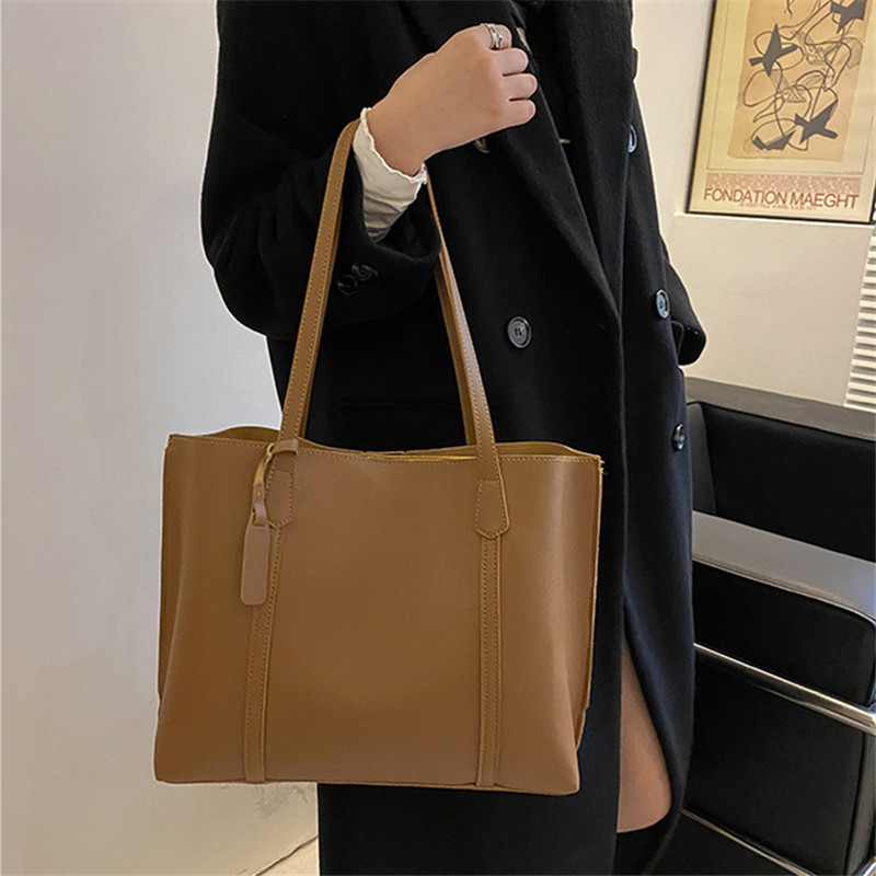 Classic Black Faux Leather Tot - Luxury Bags 2026 review and price