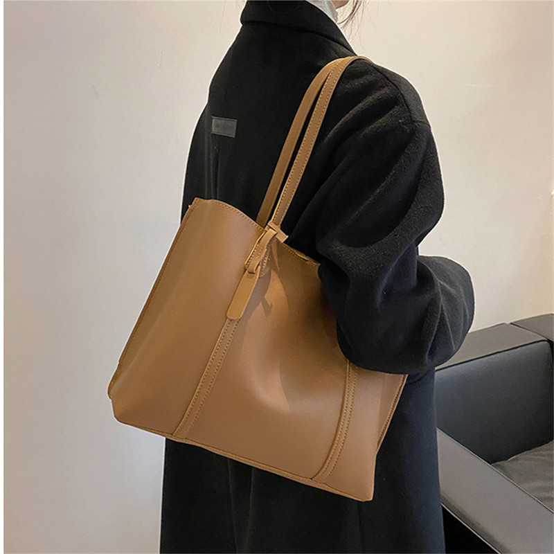 Classic Black Faux Leather Tot - Luxury Bags 2026 review and price